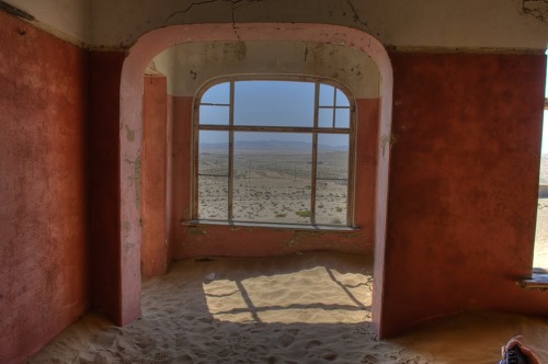 leighhecking:In southern Namibia, there is a ghost town named Kolmanskop that is slowly being taken 