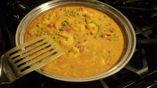 Paleo Friendly Shrimp Curry with peas and Cauliflower ‘Rice"  Recipe here I varied my usu