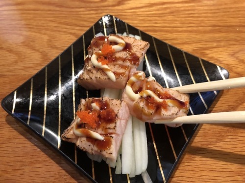 Seared fatty salmon belly, a bar special at E Sushi