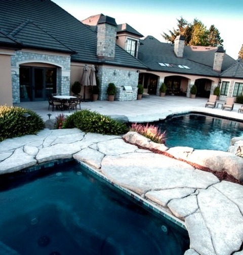 Farmhouse Pool PortlandHot Tub - Large Farmhouse Backyard Stamped Concrete And Custom-shaped Hot Tub