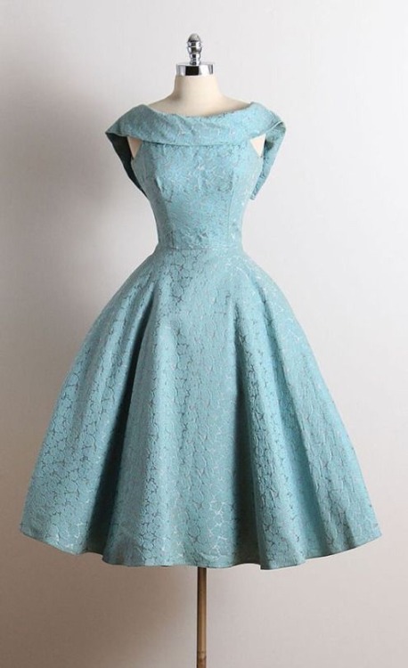 Left: Blue cotton faille dress from the 1950s. Right: Modern homecoming dress in light blue satin.