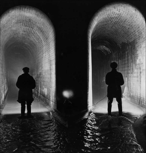 absurdonio: 1bohemian: Sewer Workers, London, 1914, photo by George Konig Two sewer workers examine 