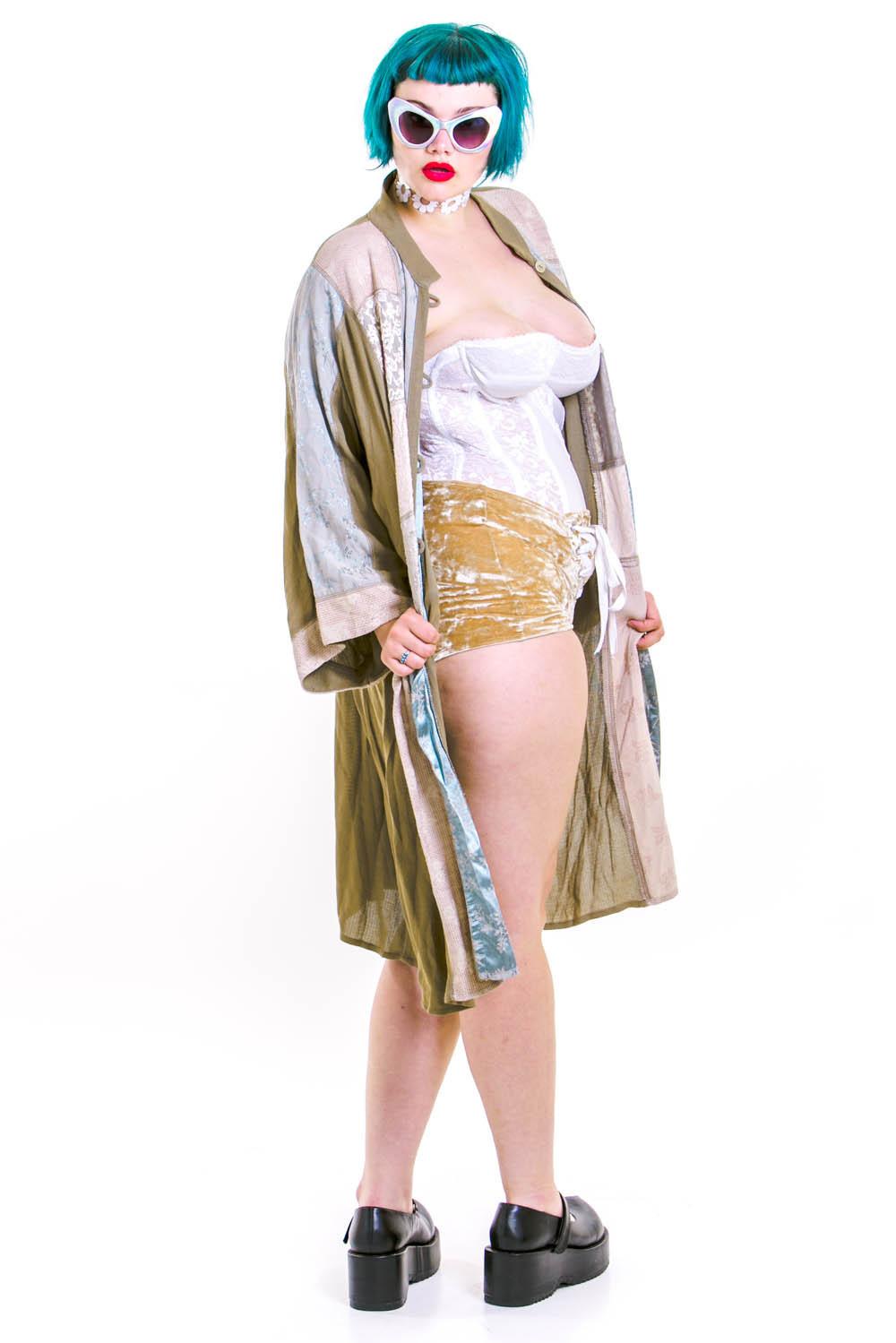 killerkurves:  Isabel Hendrix (5’10”, 38-33-47) in dusty-sage-jacket