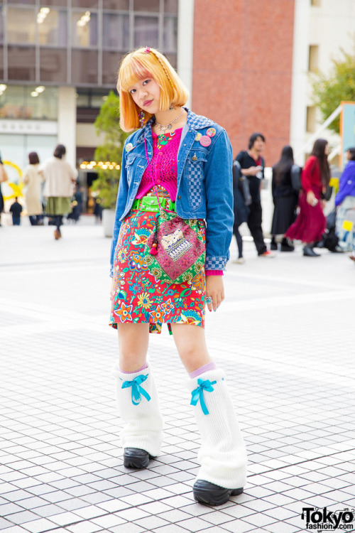 20-year-old Rizna - publisher of Fanatic Tokyo Magazine - on the street in Tokyo wearing a denim jac
