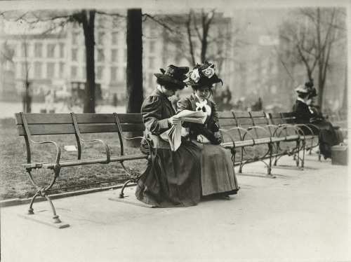 Two Women Sitting on a Bench in Union Square Park, New York, One of Them Reading a NewspaperLewis Wi