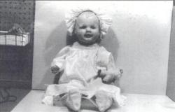 sixpenceee:Mandy is an antique porcelain doll from the 1910s that’s supposedly possessed. She currently resides in the Quesnel Museum in British Columbia, where both staff and guests have reported hearing the sounds  of a baby crying at night as well