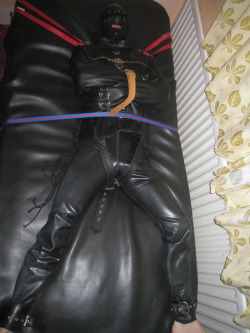 northernleather:A gimp restrained