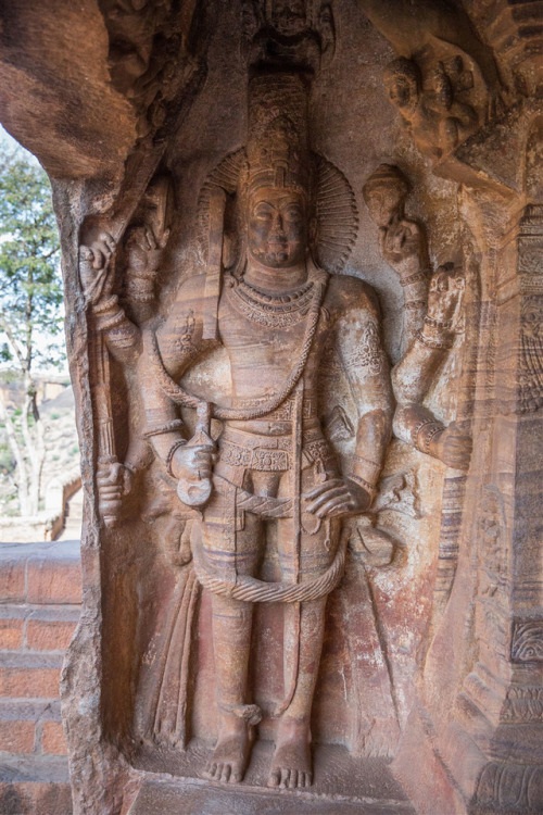 Eight armed Vishnu from Badami, Karnataka, photo by Kevin Standage, more at https://kevinstandagepho