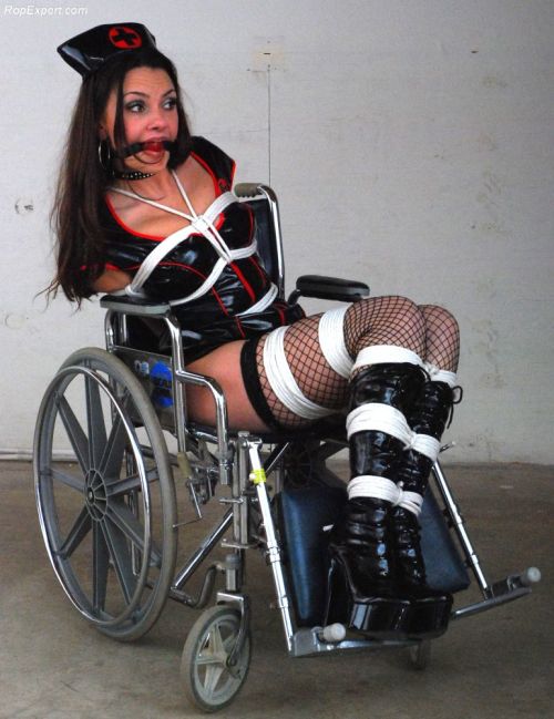 graybandanna:  Evil nurse tied to a wheelchair 