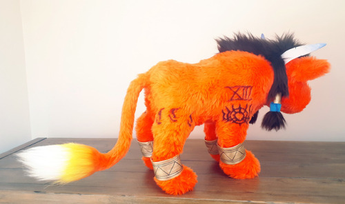 I finally made a Red XIII plush. This is reworked from an earlier attempt in order to get the body p