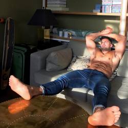 paulsbunion:  Big Steve came over after a double shift at the plywood plant…kicked off his shoes and socks, shirt and plopped his huge bare feet on my table…and nodded off! Looks like Steve will be hosting a foot meal tonight!