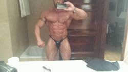 roidedmusclebullswithemptyposers:  love that black tight pvc poser,fucking woof yummy xx.