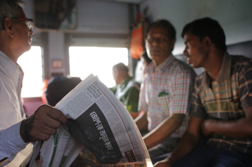 Squeezed on an overflowing train to Shantiniketan. 