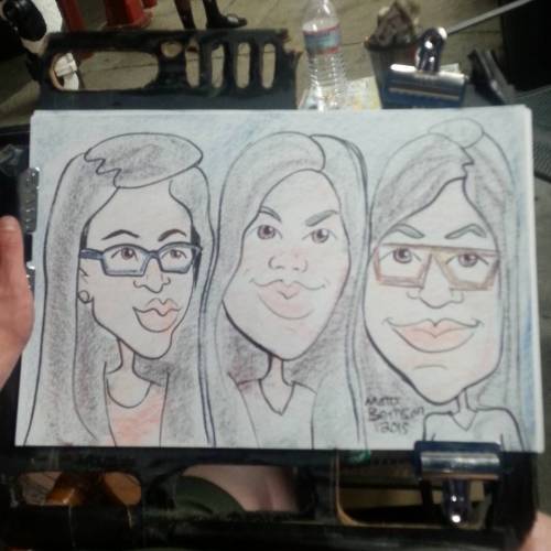 Drawing caricatures at Dairy Delight today! adult photos