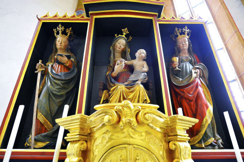 Three carved late gothic statues in the high altar of the parish church the Assumption in Launsdorf 