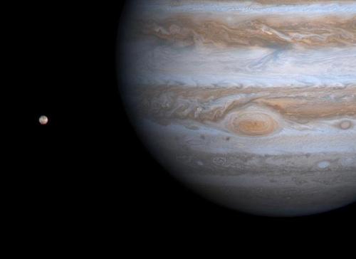 Jupiter and Io taken by the Cassini spacecraft on December 1, 2000.Credit: NASA/JPL/University of Ar