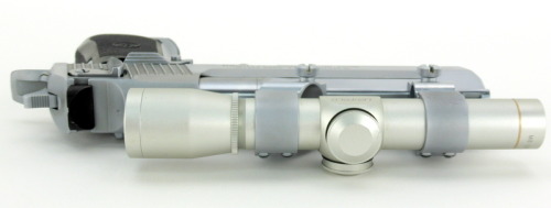 fmj556x45:  Israeli Military Ind Desert Eagle .50 AE caliber pistol. Hard chrome finish with Leupold 2x scope.
