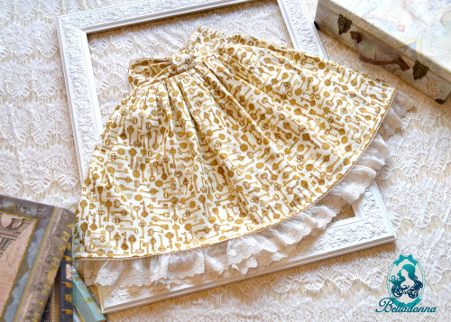  Victorian Key SkirtThis high-waist skirt is made with an exquisite golden key fabric with ivory l