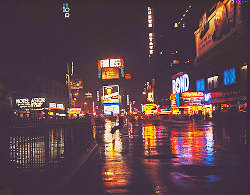 :  Rainy night in Times Square, New York. Photographed by Walter Berk. (1947) 