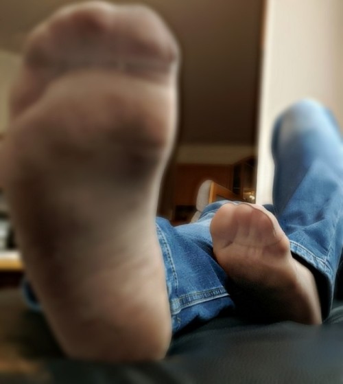 My nylon feet at a friends home. He has taken the photos