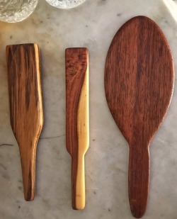 wanndare: Toy box exposé 2: three paddles handmade by W out of Australian timber. Left to right: unknown reclaimed timber from an old work shed (thud), camphor (smack), jarrah (slap).  Caption deleters get blocked. 