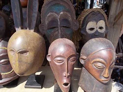 African masks & sculptures (including a chair relief). Offered: Rynek, Wroclaw, Poland - jarmark