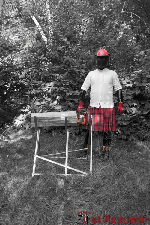 The Rubber Highland Games 2018 - Part 2 of 7Rubbered husband cutting wood in the garden