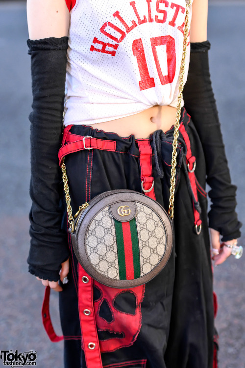 19-year-old Japanese student Nana on the street in Harajuku wearing a Hollister crop top she got fro