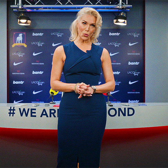 Rebecca Welton addresses the press room as she announces Roy's new position as head coach.
