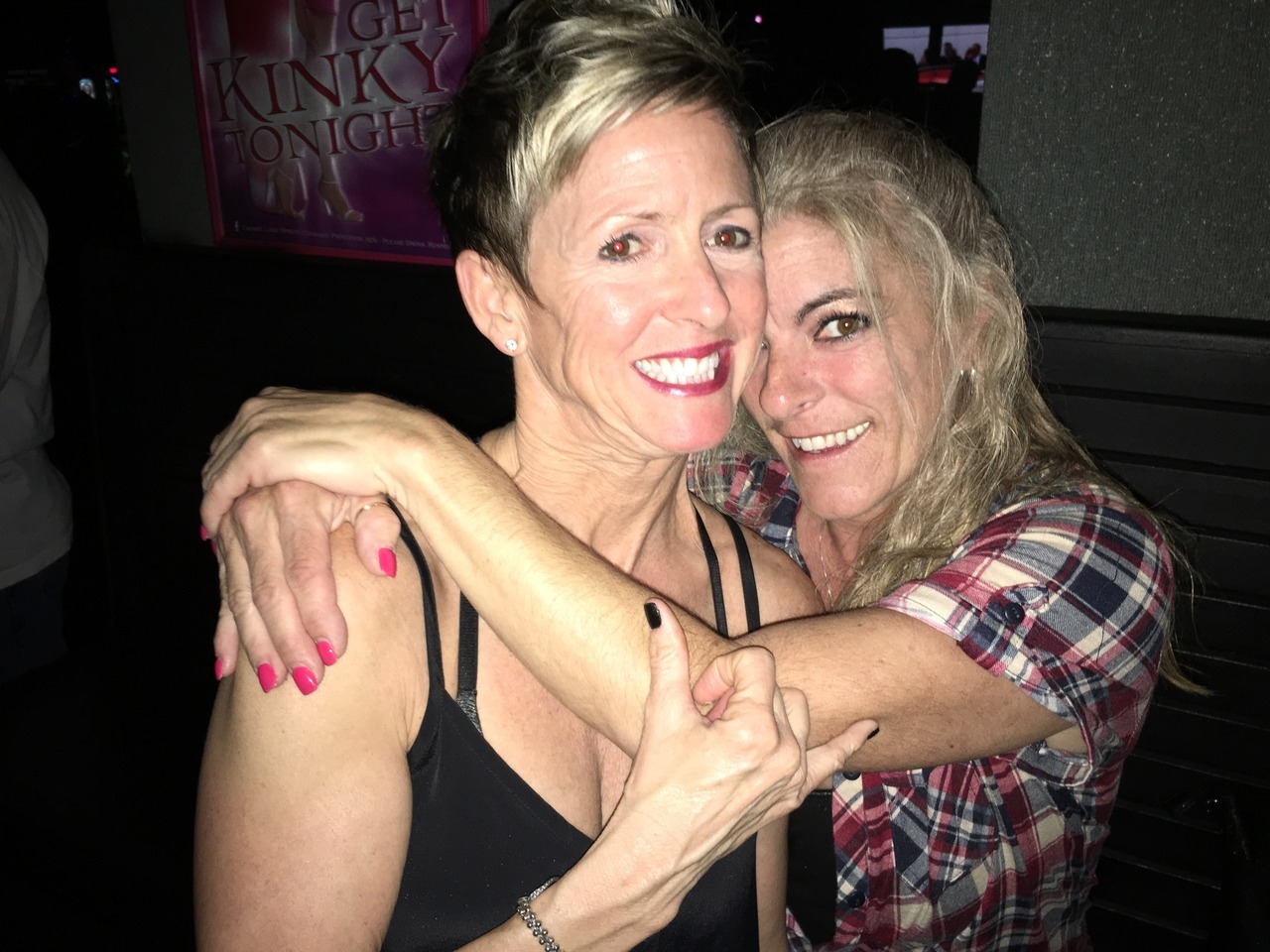 southernfeeling:  Wives are ready to fuck . Posing in front of poster in club, Get