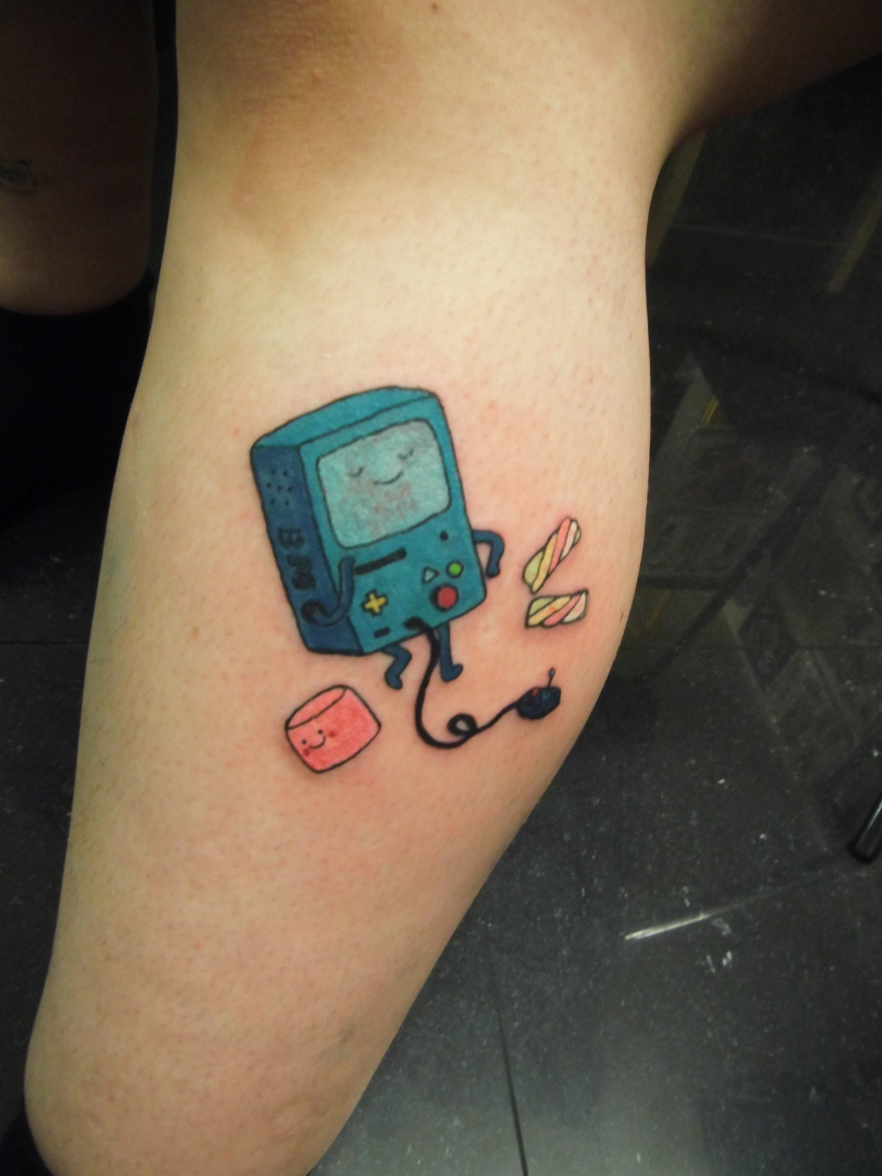 Sometimes you can still catch me dancing in it  Tattoo 25 BMO from Adventure  Time And of course
