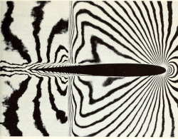 nemfrog:Air flow at high subsonic speed round a wing section in a wind tunnel - a picture taken at one millionth of second. Space encyclopaedia. 1960.