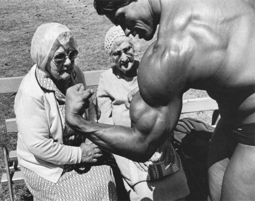 Arnold Schwarzenegger flexing for two old women in Sydney 1980 by JizzedOnHerAss