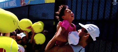 Rafael Nadal Comforts A Crying Child At A U.S. Open Fan Signing