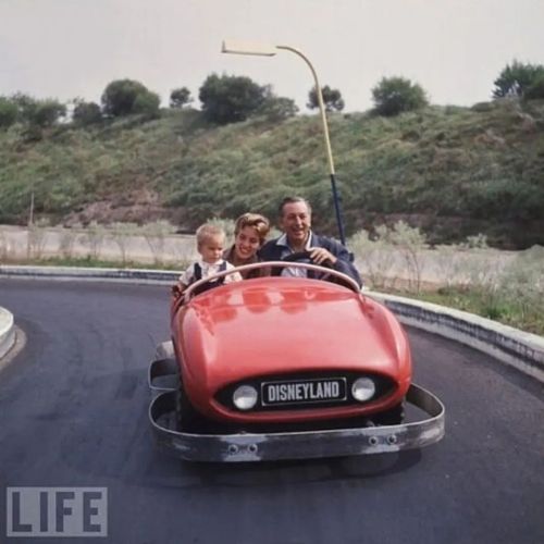 Walt’s daughter Diane, and her son Christopher riding the Autopia with Grandpa at the wheel! P