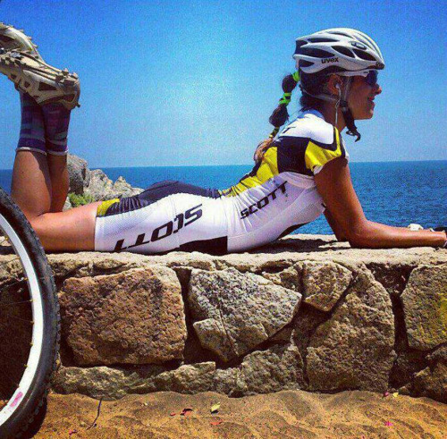 velovixens: Lying on the seawall.  velovixens.tumblr.com