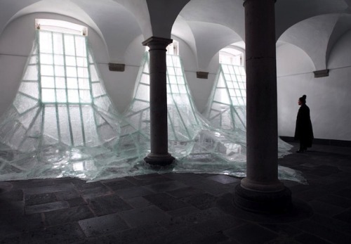  Aerial | Baptise Debombourg. Shattering glass flooding into a room of Brauweiler Abbey in Germany. 