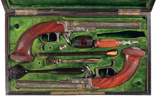 Cased set of French engraved gold inlaid underhammer percussion dueling pistols by Gosset, early to 