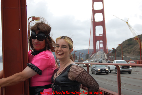 mistressaliceinbondageland:I have been having SO MUCH FUN with Pride Season in full swing here in kinky San Francisco. Here is a photo from my favorite humiliation scene of all time!!!I tied my friend’s sissy slave to the Golden Gate Bridge during rush