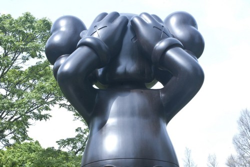 supersonicart:   KAWS in Amsterdam. KAWS recently put up three new sculptures in Amsterdam as part of this year’s ArtZuid 2015.  These sculptures are titled “Along the Way,” (The two figures standing together), “At This Time,” (The lone statue