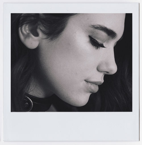 dua-daily: Dua Lipa photographed by Ryan Parker She’s lovely. But is she wearing a bondage col