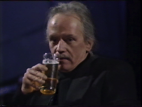 TURN UP THE STROBE — just john carpenter sipping a glass of beer
