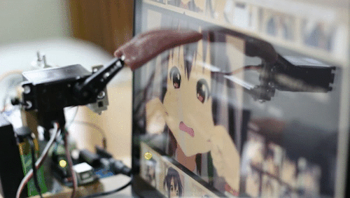 nentindo: dailydot:This Japanese dude built a robotic tongue to lick his favorite anime characters Y