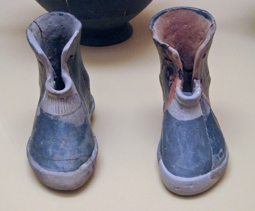 worldhistoryfacts:A pair of terracotta boots from an ancient Greek burial. They were found with the 