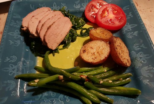 Quick and easy healthy meal for a Saturday night dinner. Tuscan herb pork tenderloin served over sau