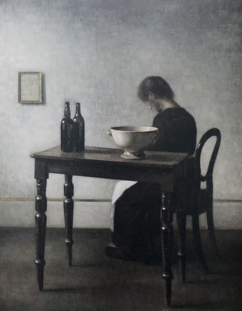 Interior with Woman Sitting at a Table  -  Vilhelm Hammershøi , c. 1910. Danish,  1864 - 1916Oil on 