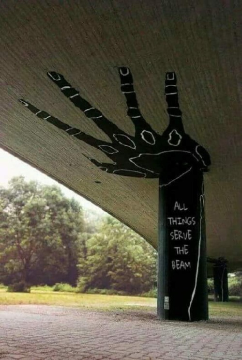 thegreatsapphicvein:[Caption: a photo of a pole holding up a beam, with a hand drawn on the ceiling,