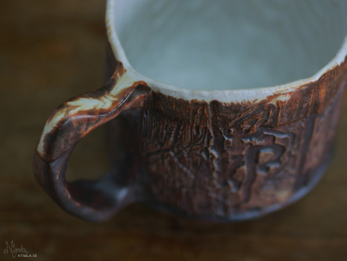 Bugmugs! The patterns are made from woodborer insects that left their marks in branches that I colle
