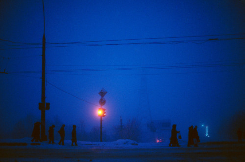 20aliens: MOLDOVA. Transdniester. 2004. Streetscene in front of a statue of Lenin, next to the Supreme Soviet building. / MOLDOVA. Transdniester. 2004. People headed to work in the morning. Jonas Bendiksen