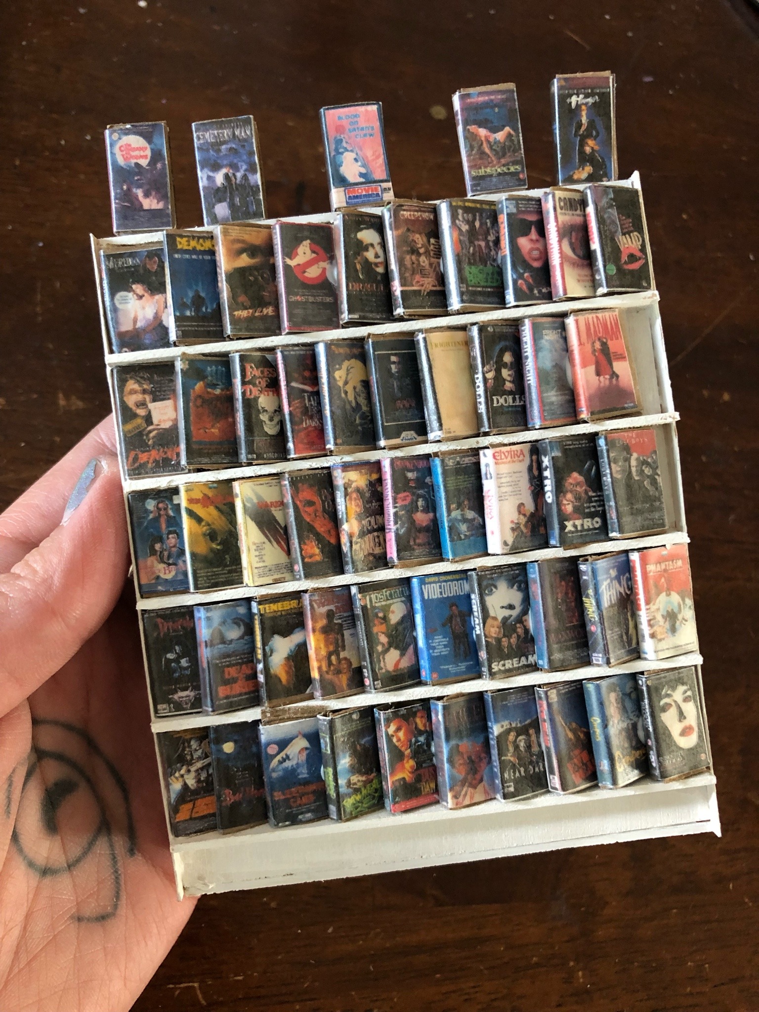 thegothicalice:I’m that millennial cusp where Blockbuster was phasing into Netflix near the end of high school— and I miss the video store rental vibes 📼 154 of my random favorite horror movies from the 70s-90s, printed on card stock and wrapped